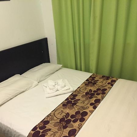 Hotel Singgah Inn Муар Екстериор снимка