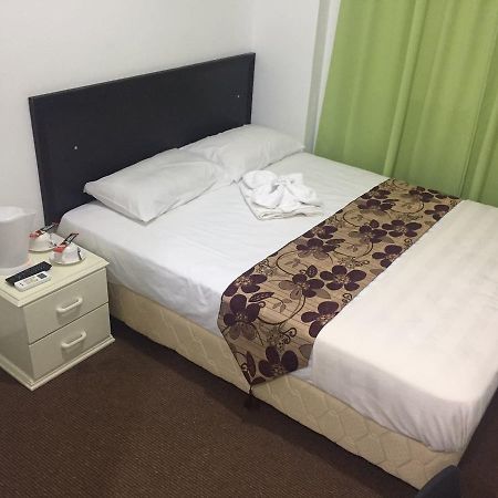 Hotel Singgah Inn Муар Екстериор снимка