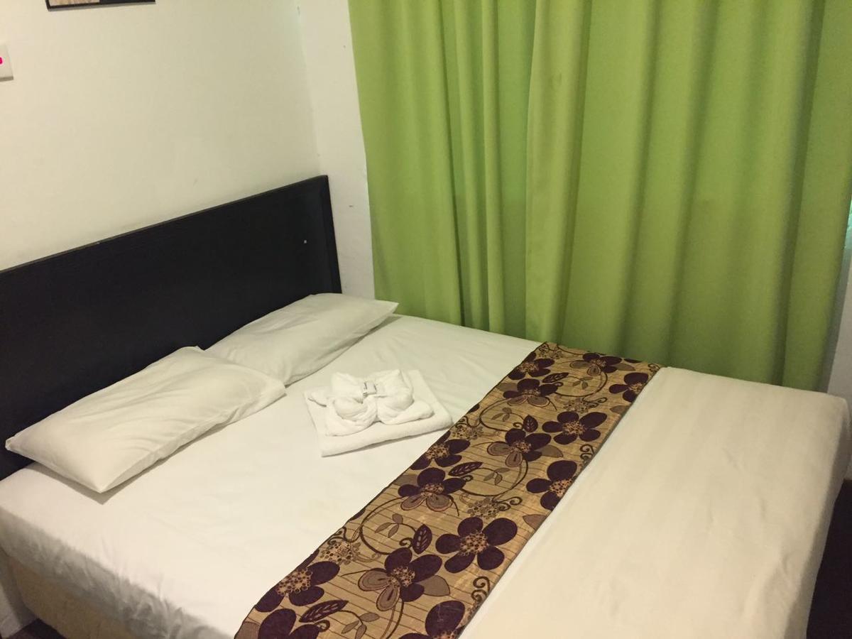 Hotel Singgah Inn Муар Екстериор снимка