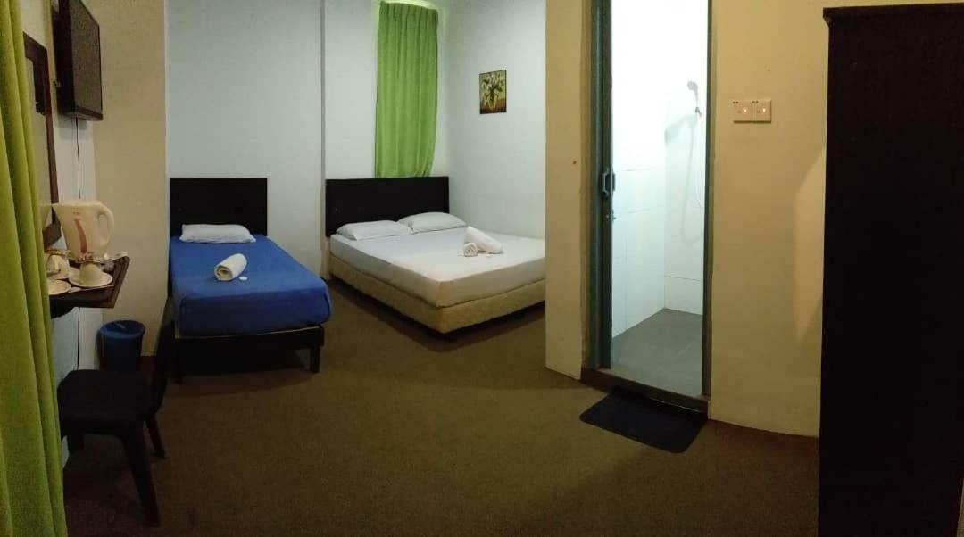 Hotel Singgah Inn Муар Екстериор снимка